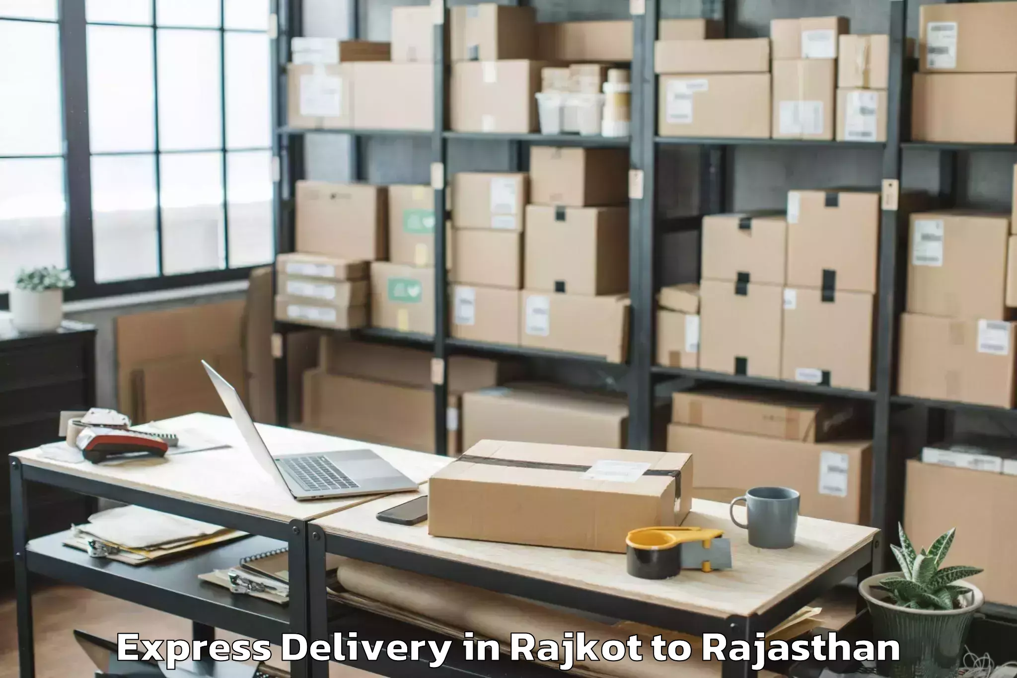 Hassle-Free Rajkot to Ghatol Express Delivery